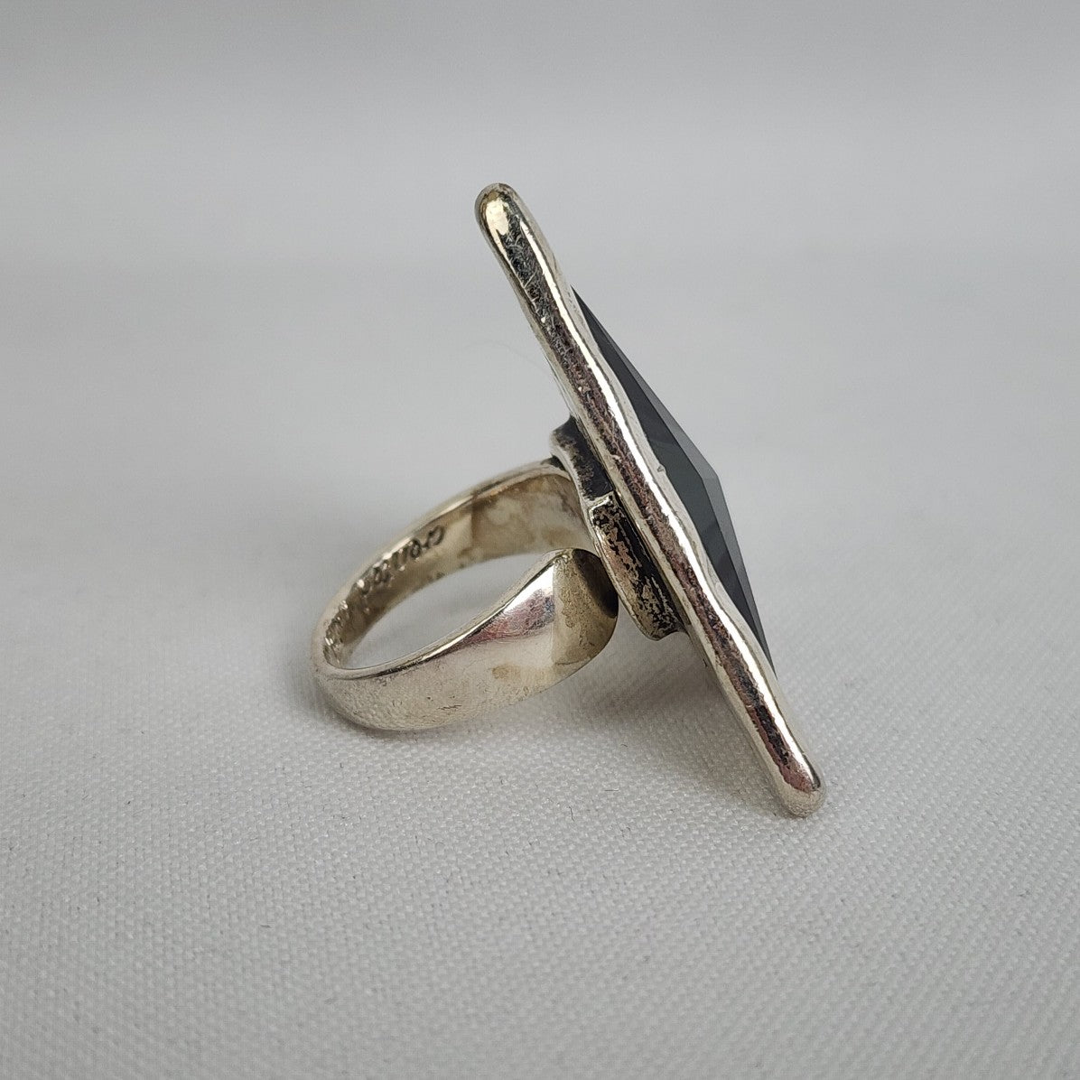 A&C Adjustable Ring with Large Faceted Triangle Glass Stone