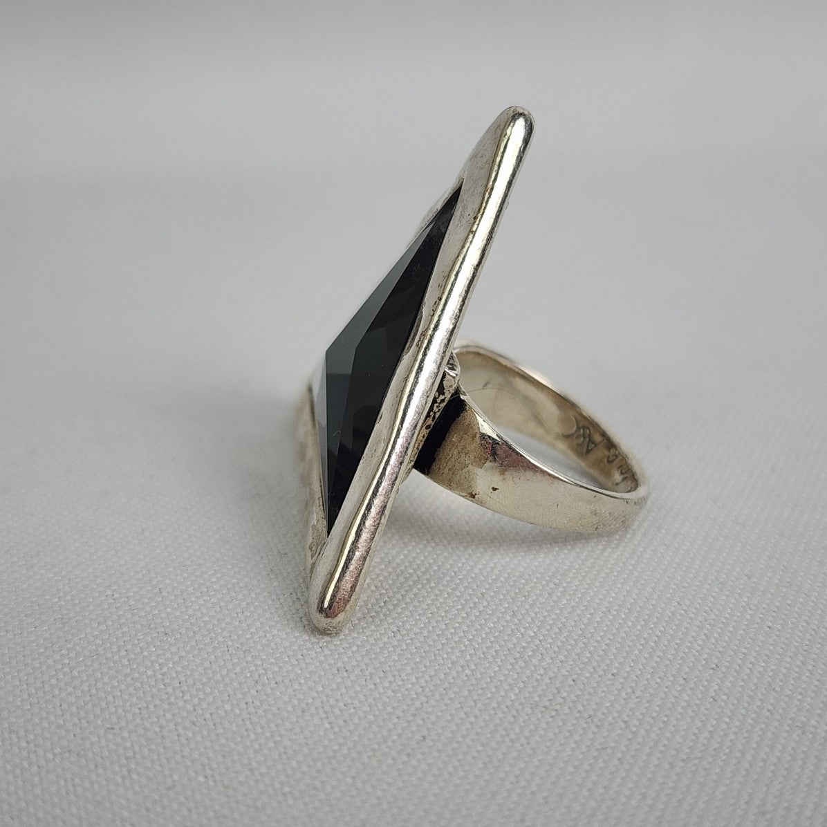 A&C Adjustable Ring with Large Faceted Triangle Glass Stone
