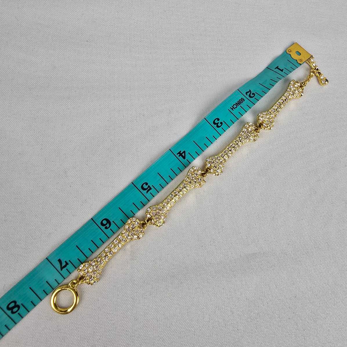 Gold Tone Crystal Dog Bone Link Toggle Bracelet