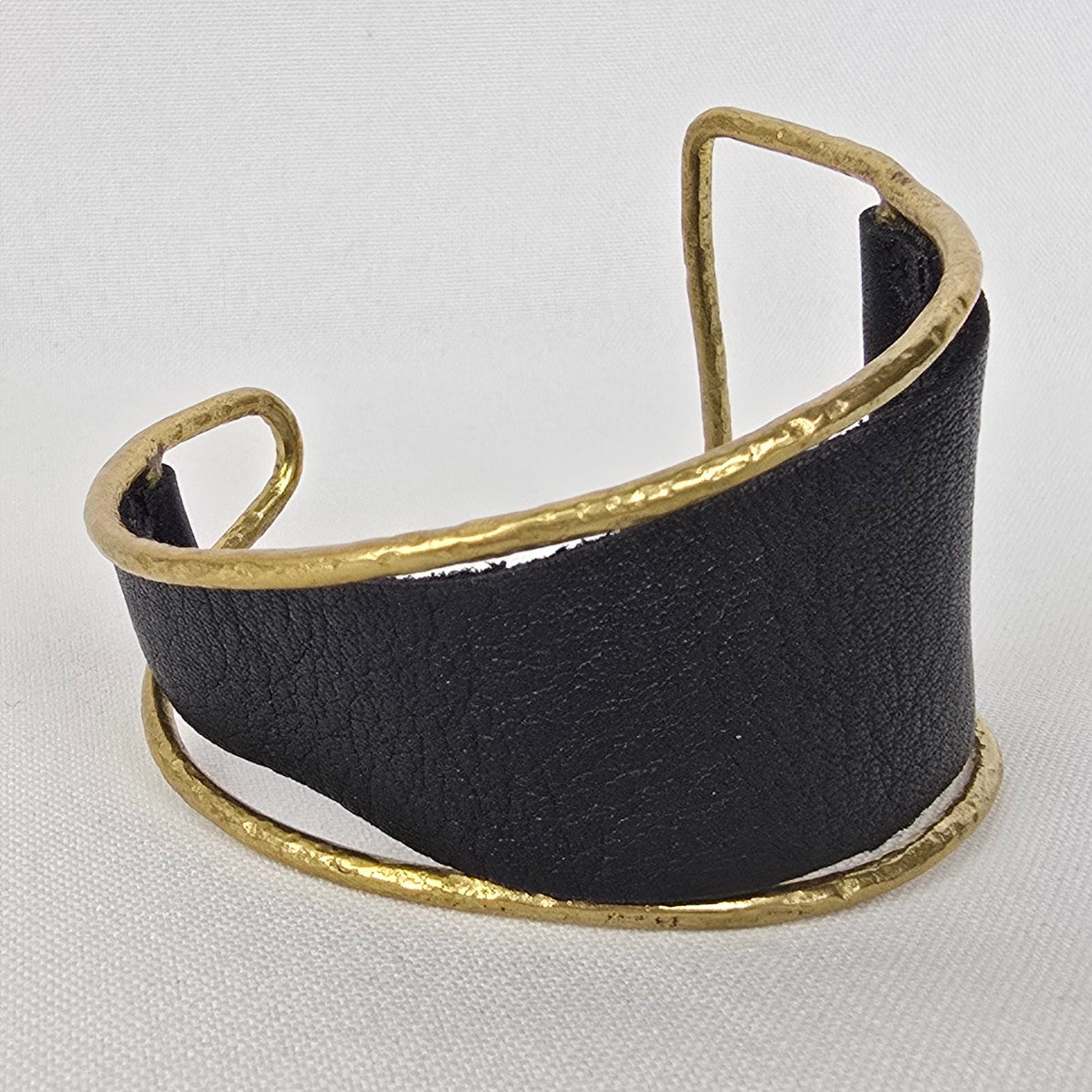 Gold Tone Black Leather Asymmetrical Cuff Bracelet