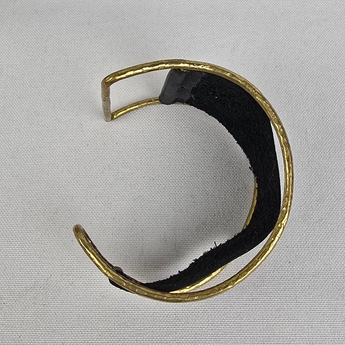 Gold Tone Black Leather Asymmetrical Cuff Bracelet