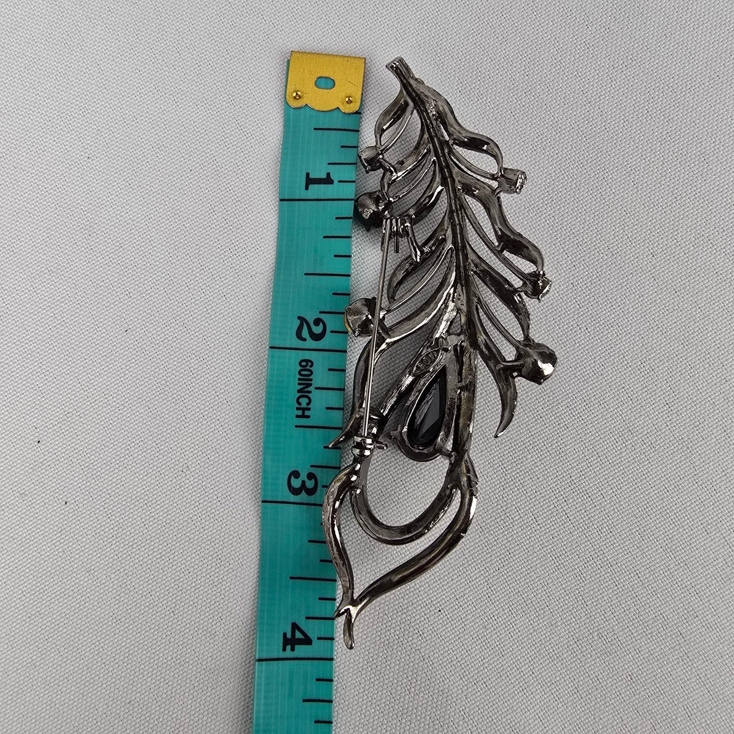 Black Rhinestone Feather Brooch