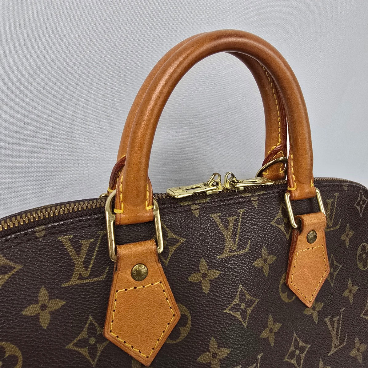Louis Vuitton Alma Vachetta Leather Monogram Top Handle Satchel Purse