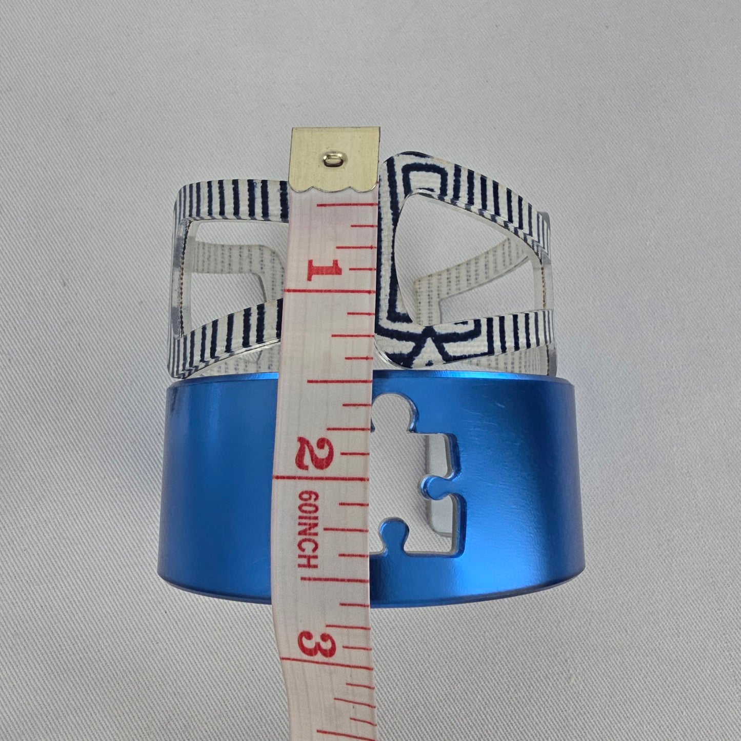 Color By Amber Blue Puzzle Piece Striped Statement Cuff Bracelet Set