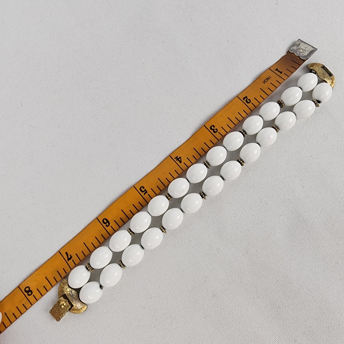 Vintage Monet White Beaded Gold Tone Bracelet