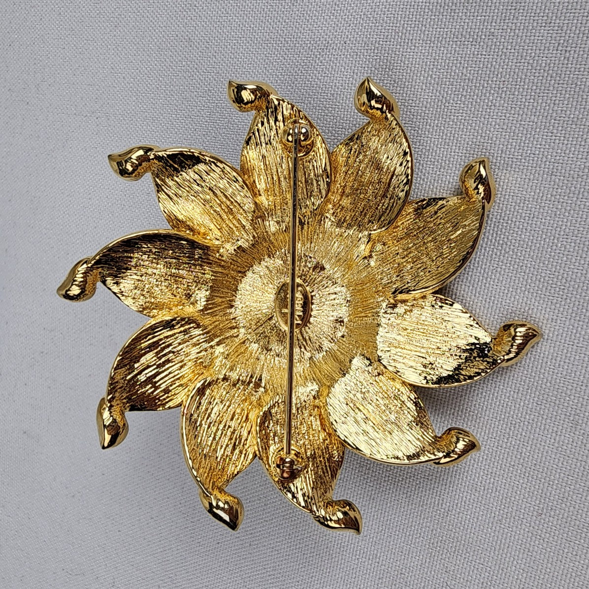 Joan rivers 2025 flower brooch