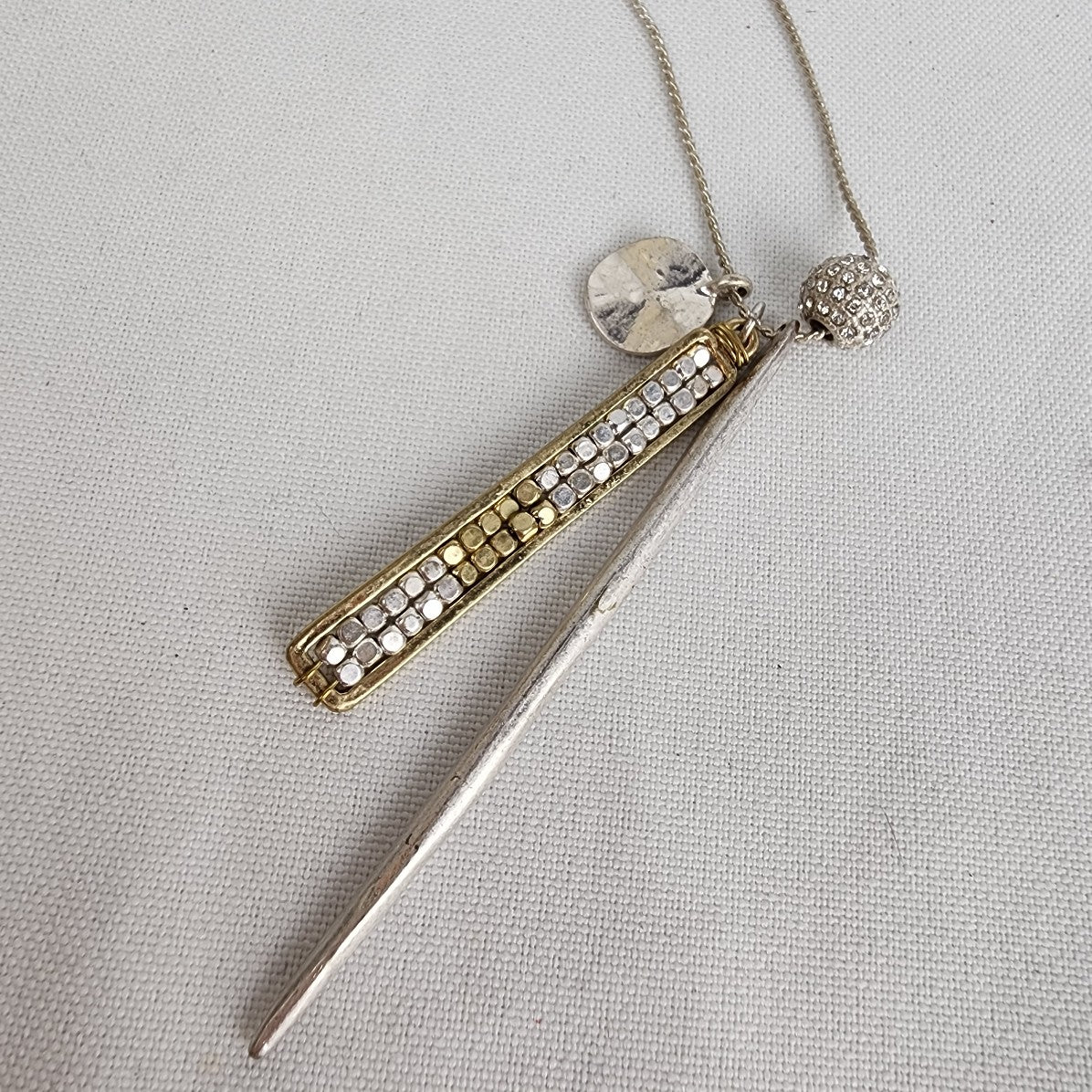 Canvas Silver Tone Long Pendant Necklace