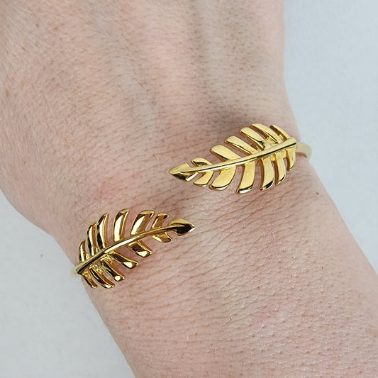 Kinsley Armelle Gold Tone Leaf Detail Hinge Bracelet