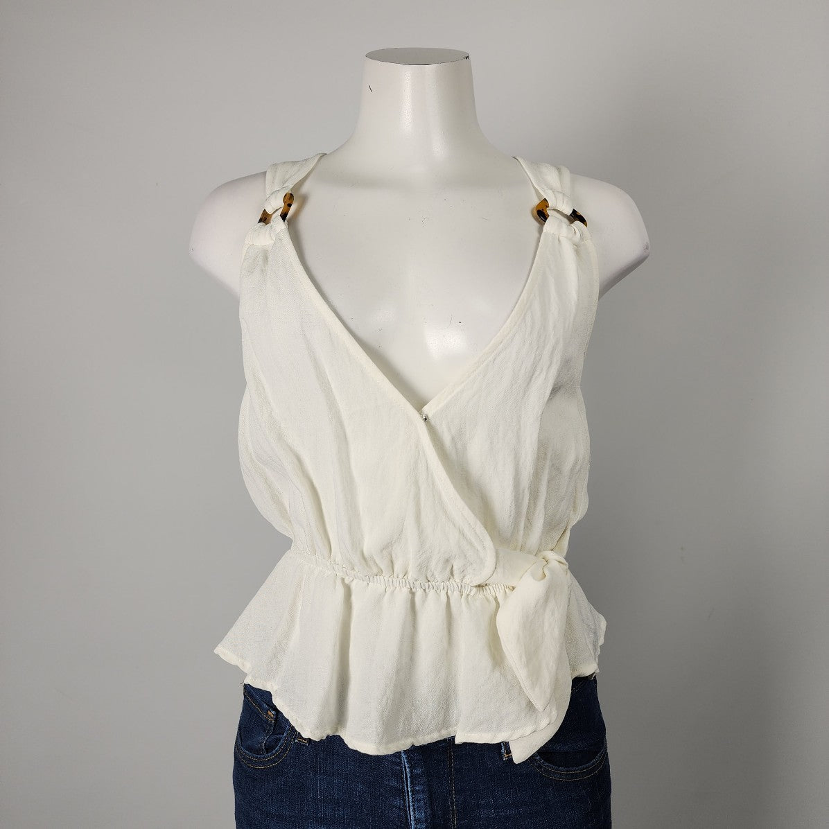 E & M White Crossover Peplum Top Size S/M