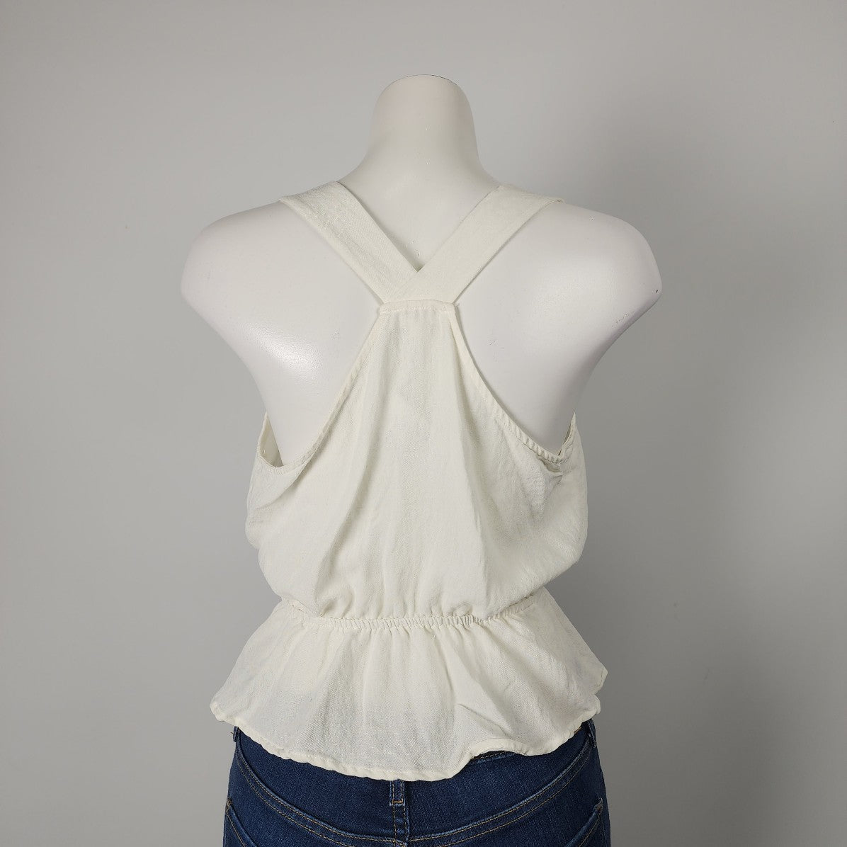 E & M White Crossover Peplum Top Size S/M