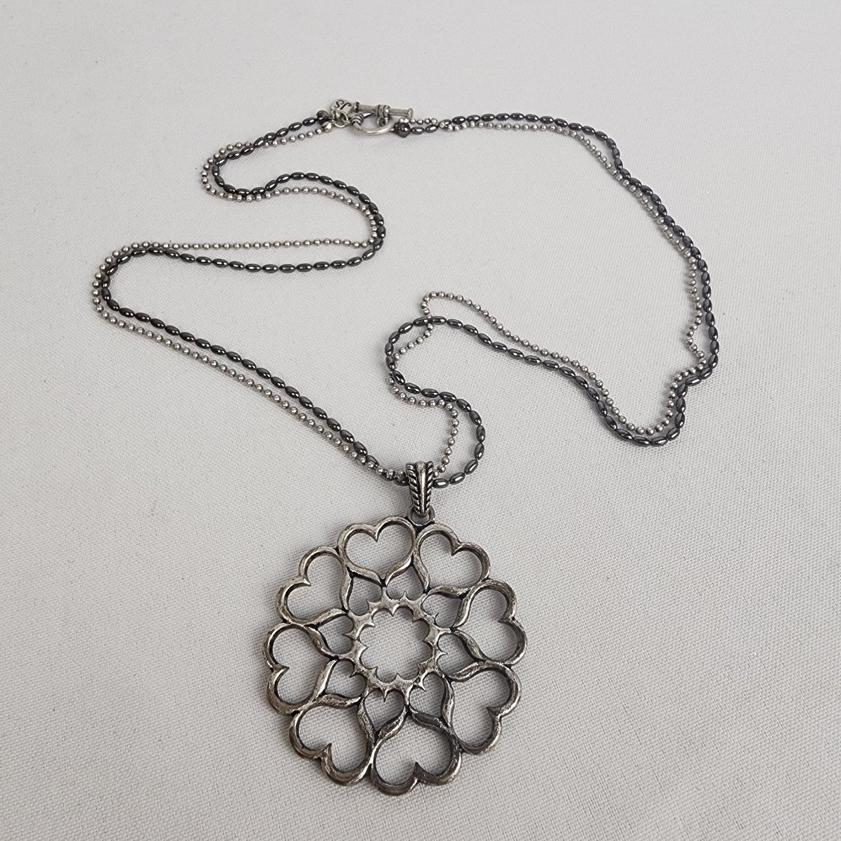 Jessica Simpson Silver Tone Flower Pendant Necklace