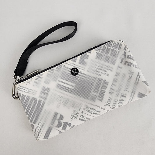 Lululemon Curved Wristlet  Manifesto Print Clutch Wallet