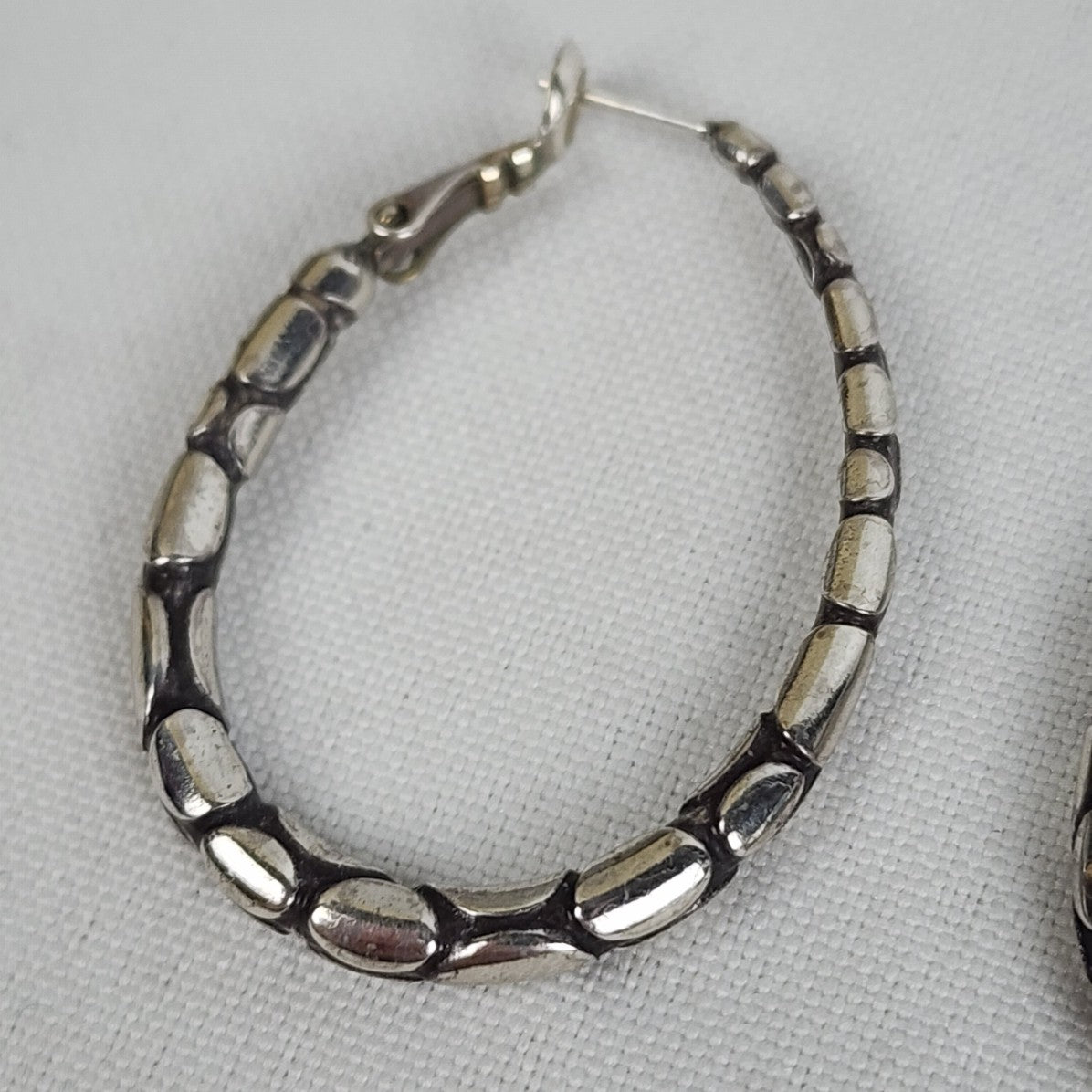 Silver Tone Pebble Oval Hoop Earrings