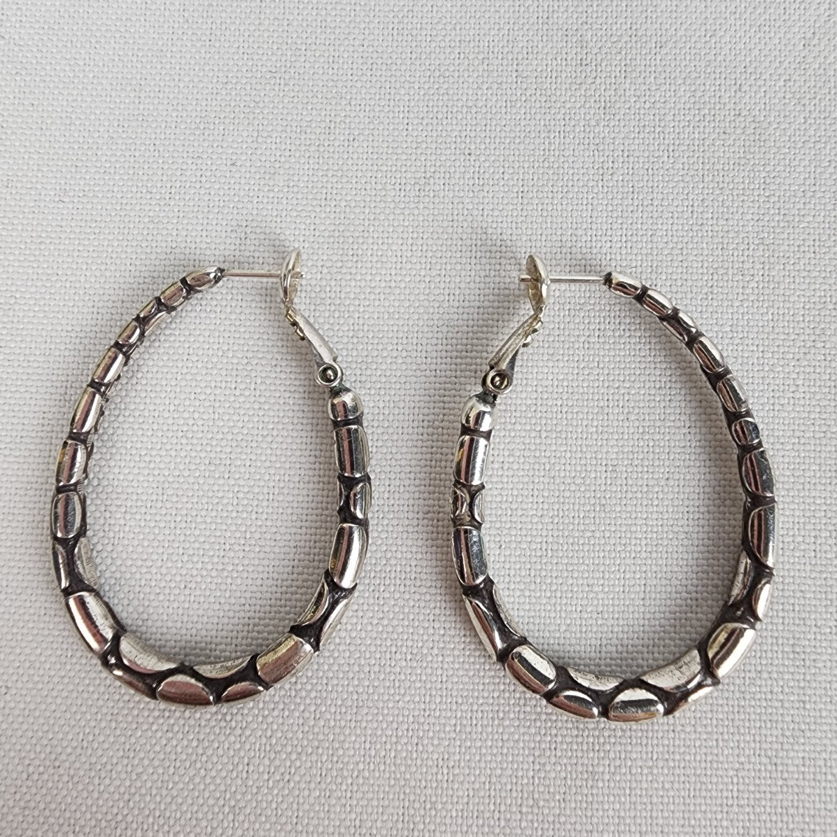 Silver Tone Pebble Oval Hoop Earrings