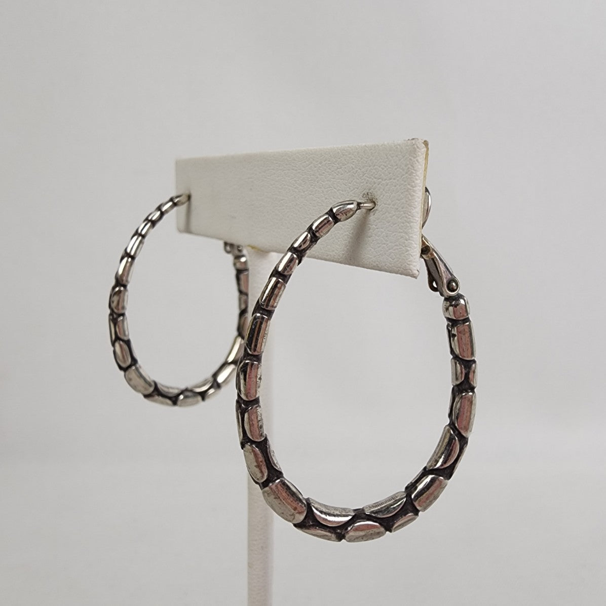 Silver Tone Pebble Oval Hoop Earrings