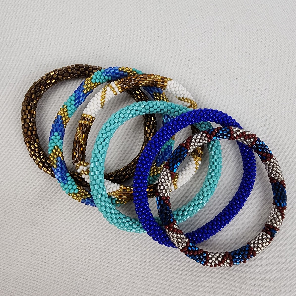 Nepal Glass Beaded Blue & Gold Roll On Bracelets