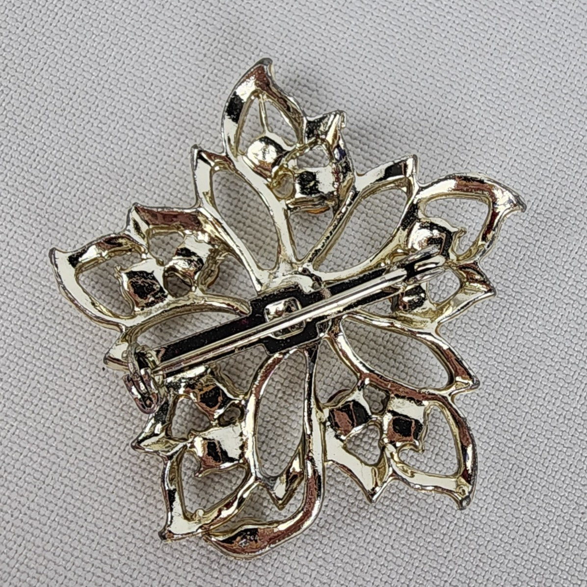 Vintage Gold Tone Purple Rhinestone Flower Brooch