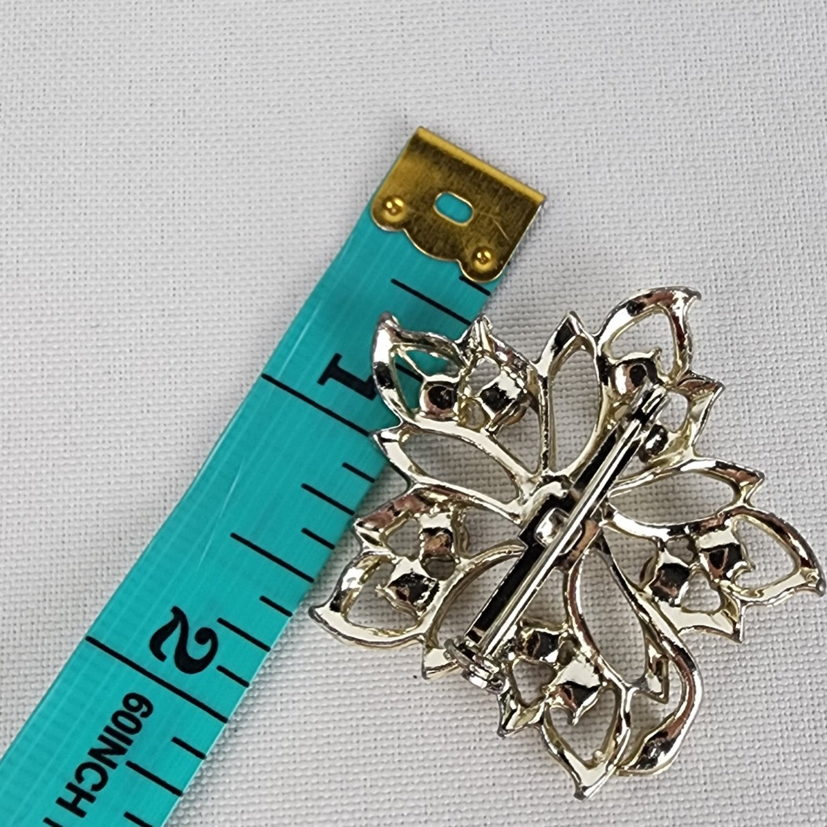 Vintage Gold Tone Purple Rhinestone Flower Brooch