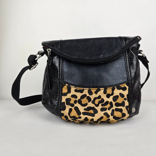 The Sak Black Leather Animal Print Pouch Crossbody Purse