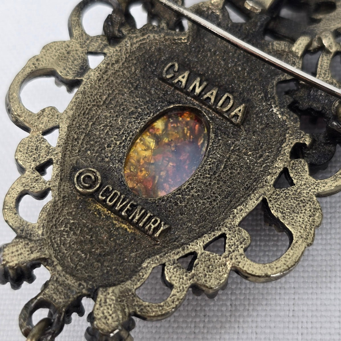 Vintage Sarah Coventry Bronze Faux Opal Brooch