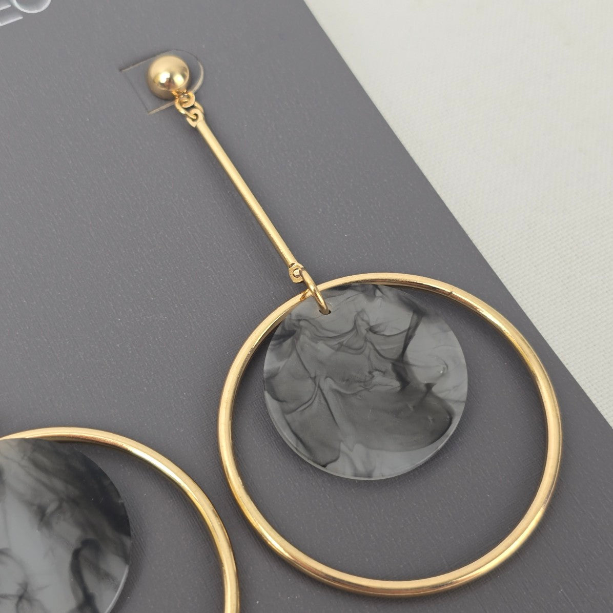 Etereo Gold Tone Grey Swirl Drop Earrings