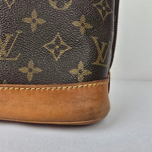 Louis Vuitton Alma Monogram Top Handle Satchel Purse