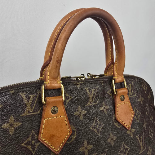 Louis Vuitton Alma Monogram Top Handle Satchel Purse