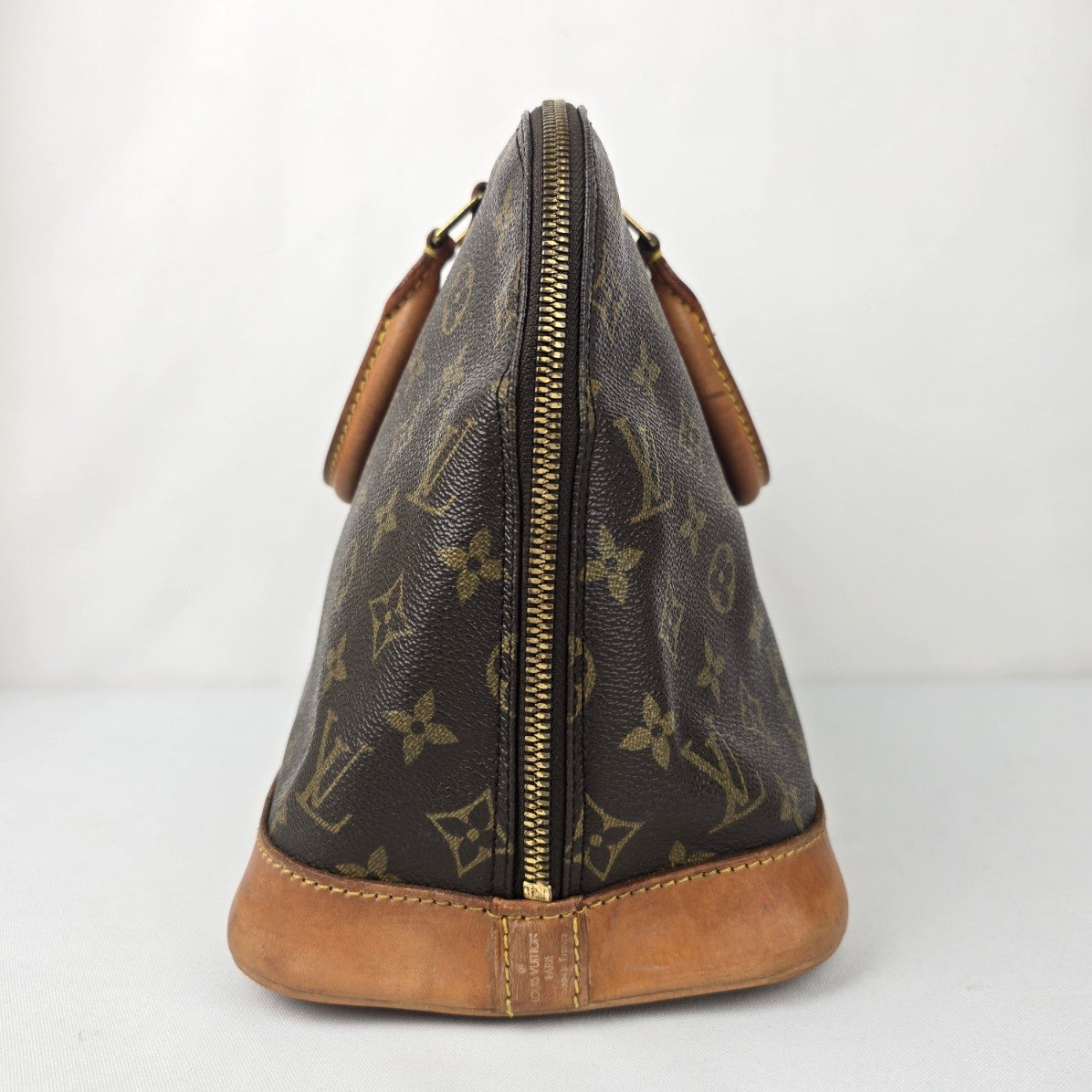 Louis Vuitton Alma Monogram Top Handle Satchel Purse