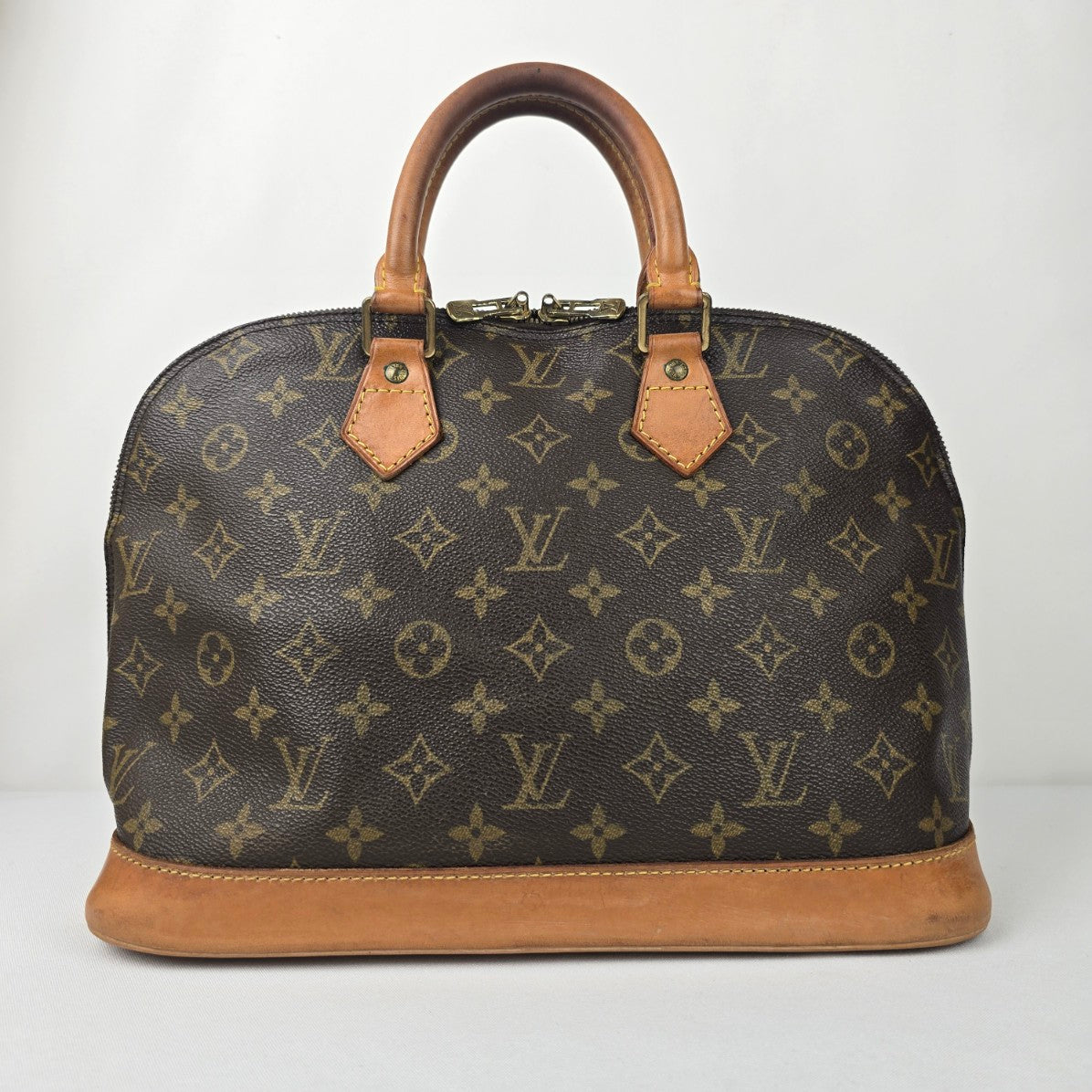 Louis Vuitton Alma Monogram Top Handle Satchel Purse