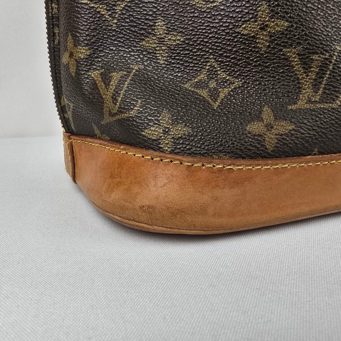 Louis Vuitton Alma Monogram Top Handle Satchel Purse