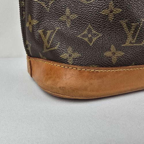 Louis Vuitton Alma Monogram Top Handle Satchel Purse