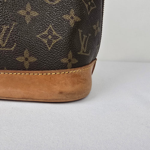 Louis Vuitton Alma Monogram Top Handle Satchel Purse