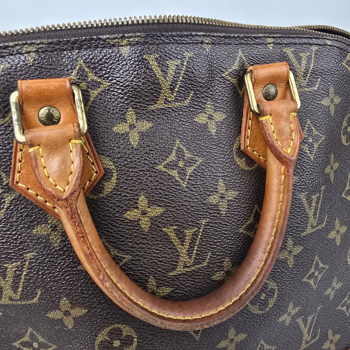 Louis Vuitton Alma Monogram Top Handle Satchel Purse