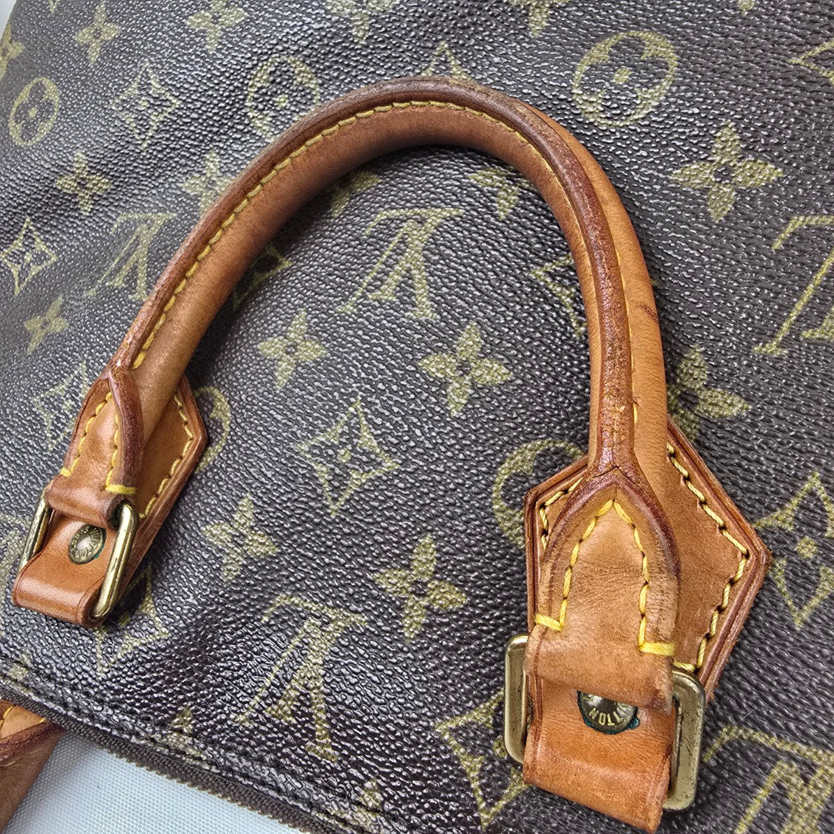 Louis Vuitton Alma Monogram Top Handle Satchel Purse