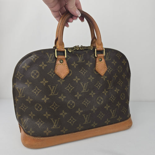 Louis Vuitton Alma Monogram Top Handle Satchel Purse