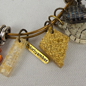 Color by Amber Gold Tone Charm Bracelet