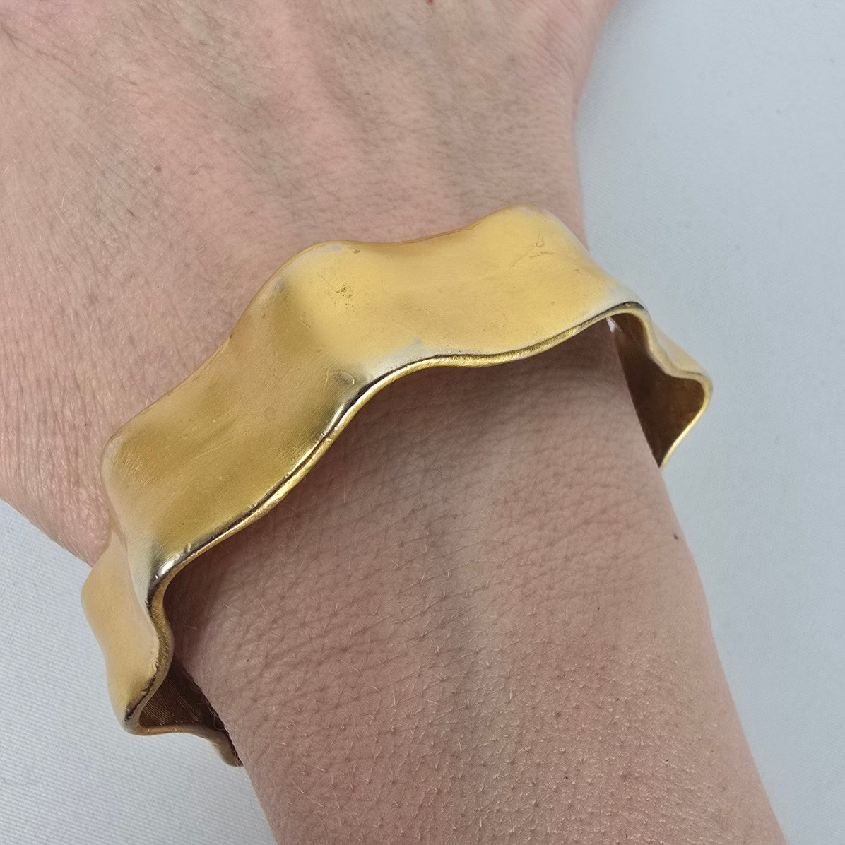 Gold Tone Wavy Bangle Bracelet