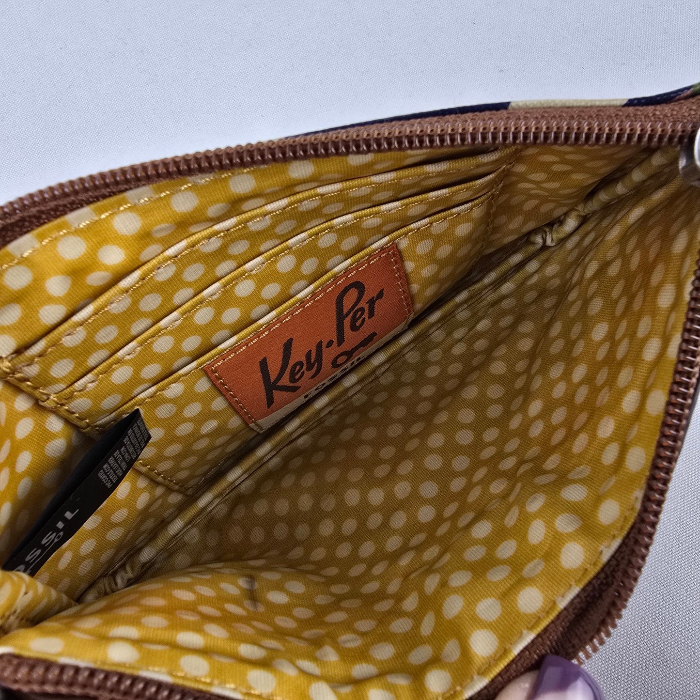 Fossil Key Per Floral Coated Canvas Wristlet