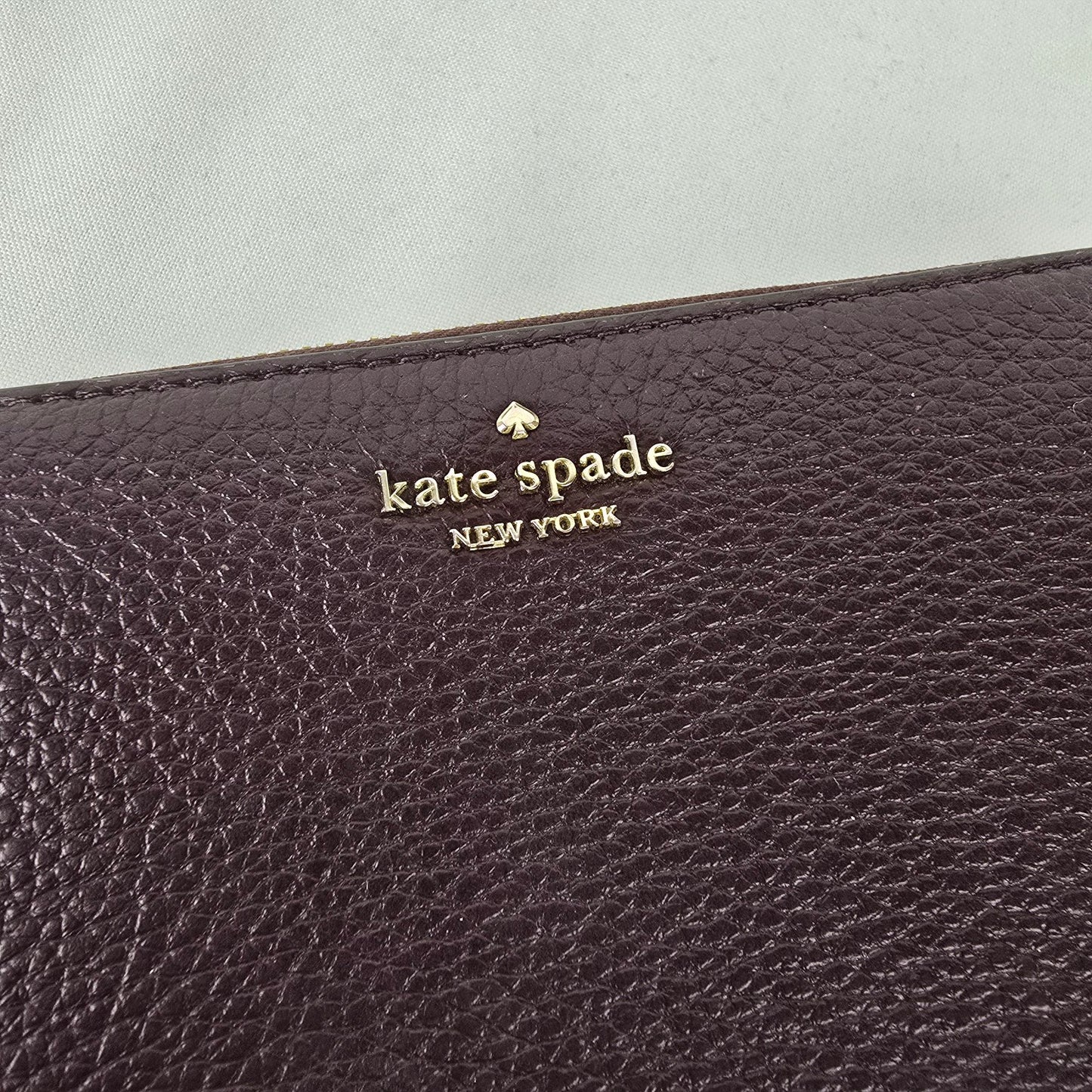 Kate Spade Burgundy Pebbled Leather Zip Around Wallet