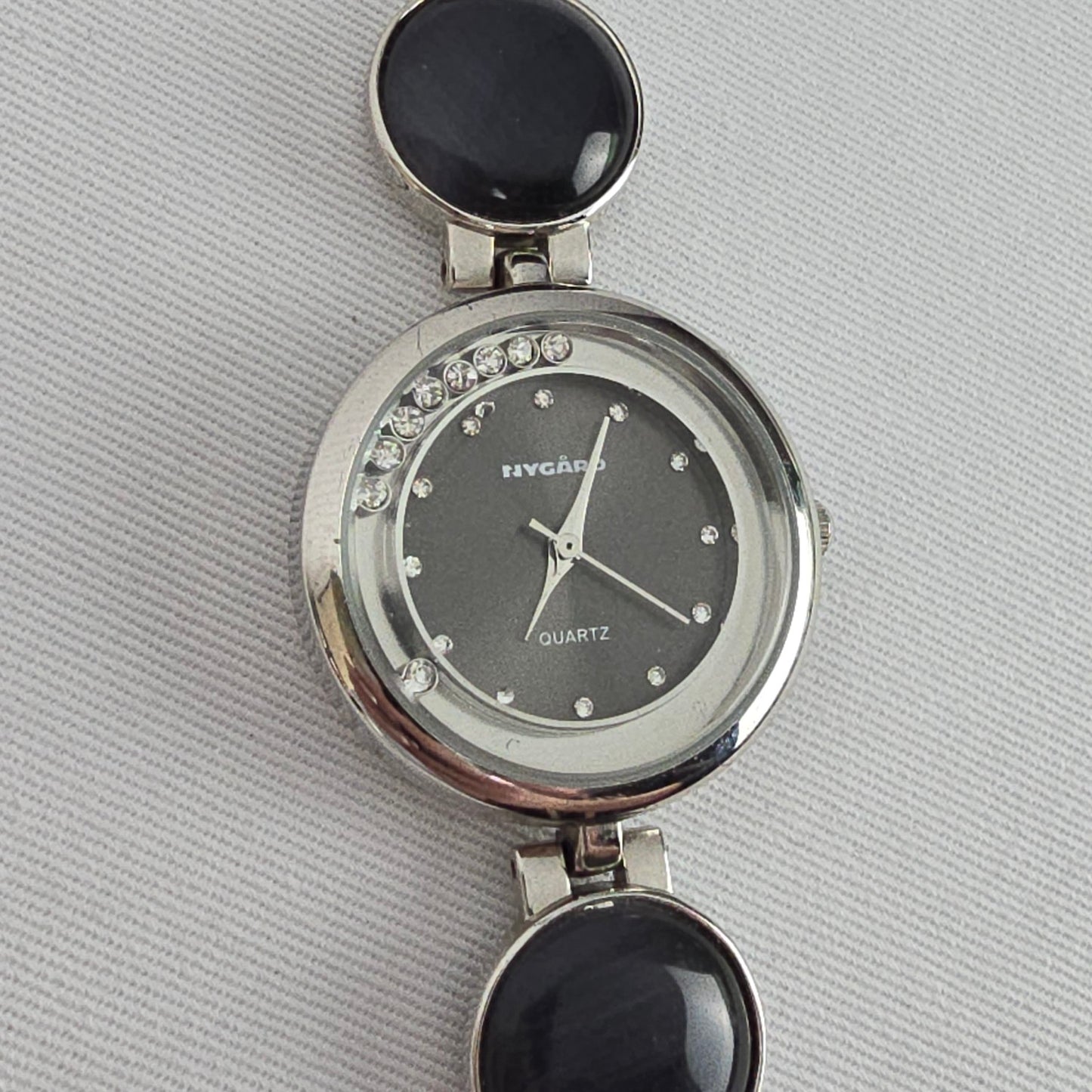 Nygard Quartz Bracelet Watch Silver Tone Black Cabochon Links Crystal Dial