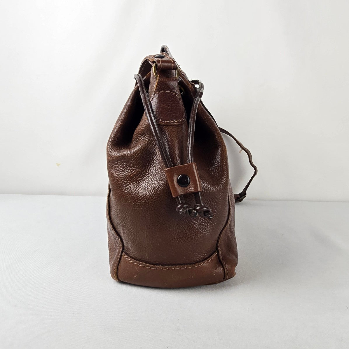 Vintage Brown Leather Drawstring Bag Crest Detail Slouchy Boho Crossbody