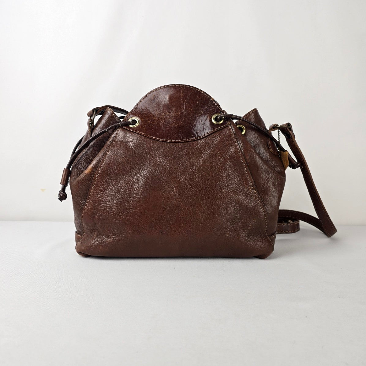 Vintage Brown Leather Drawstring Bag Crest Detail Slouchy Boho Crossbody