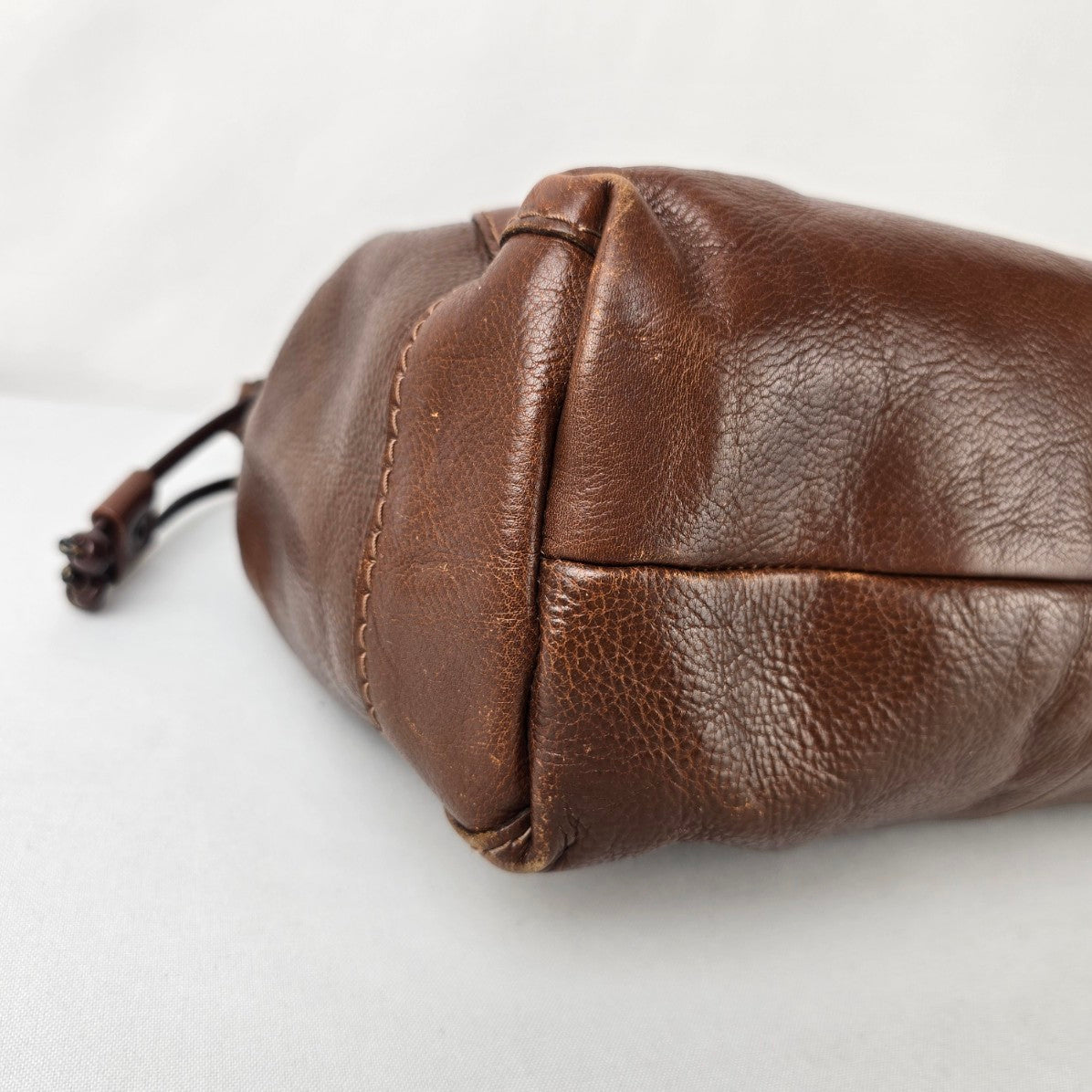 Vintage Brown Leather Drawstring Bag Crest Detail Slouchy Boho Crossbody