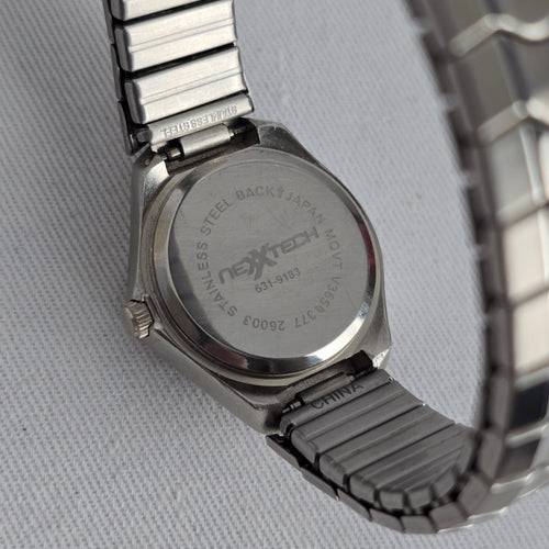 NextTech Quartz Watch Silver Tone Stretch Band Japan Movement