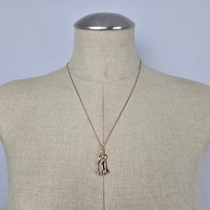 Vintage Gold Tone Woman Walking Dog Pendant Necklace