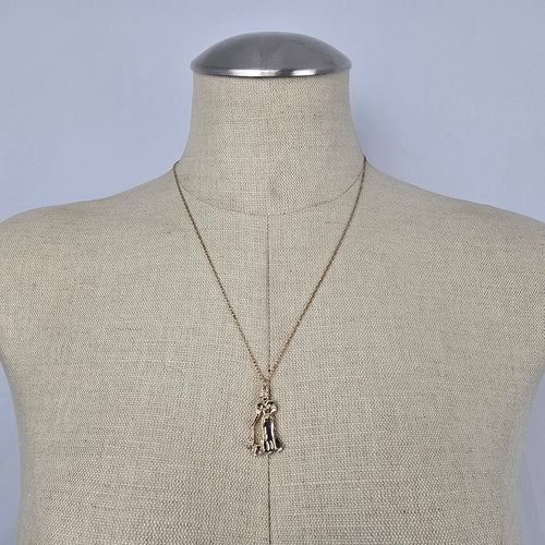 Vintage Gold Tone Woman Walking Dog Pendant Necklace