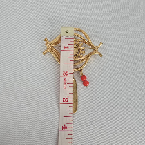 Vintage Gold Tone Tribal Mask Brooch with Red Bead Dangles