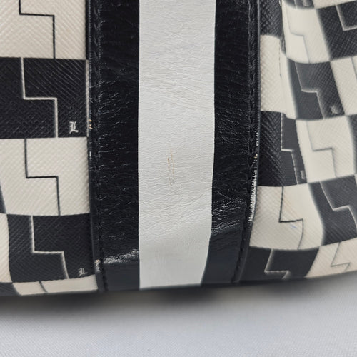 L.A.M.B. Black White Geometric Drawstring Shoulder Bag