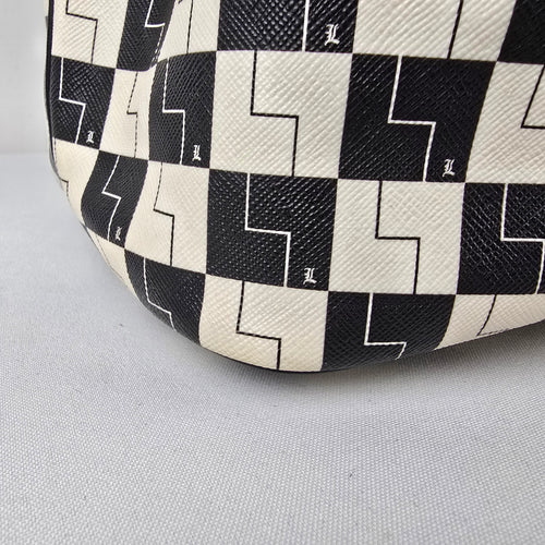 L.A.M.B. Black White Geometric Drawstring Shoulder Bag