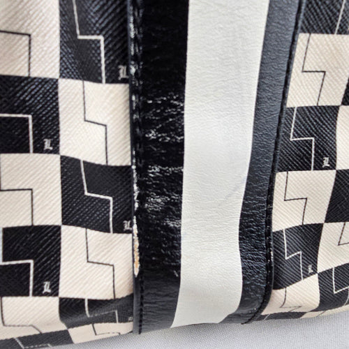 L.A.M.B. Black White Geometric Drawstring Shoulder Bag